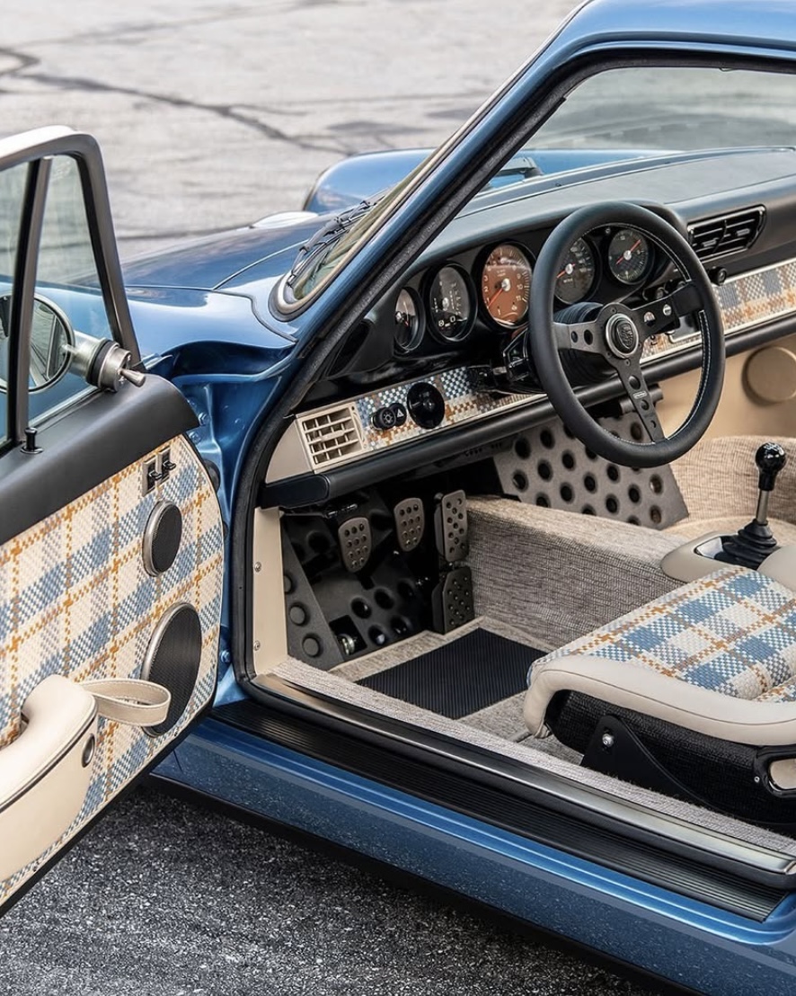 Vintage Porsche interior with plaid upholstery